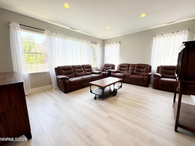 6726 Runnymede Dr, Sparks, NV 89436 - living area with light wood-style floors, recessed lighting, and baseboards