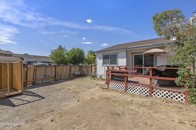 11050 Zeolite Dr, Reno, NV 89506 - fenced backyard with a deck