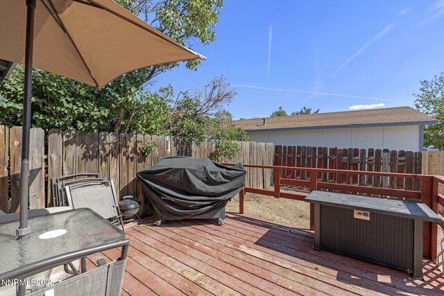 11050 Zeolite Dr, Reno, NV 89506 - wooden terrace with a fenced backyard