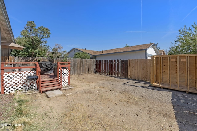 11050 Zeolite Dr, Reno, NV 89506 - fenced backyard featuring a wooden deck