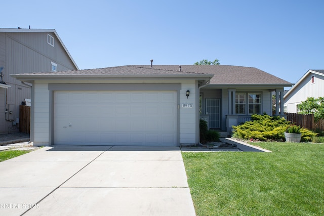 8975 Sorcha St, Reno, NV 89506 - view of front facade with concrete driveway and a garage