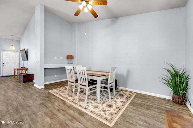 8975 Sorcha St, Reno, NV 89506 - dining area with wood finished floors, ceiling fan, and baseboards