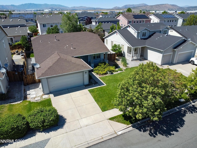 8975 Sorcha St, Reno, NV 89506 - aerial perspective of suburban area with a mountainous background