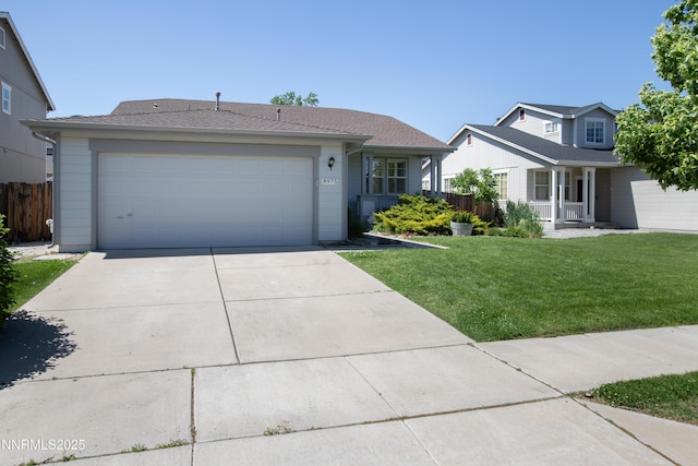 8975 Sorcha St, Reno, NV 89506 - view of front of home featuring concrete driveway and a garage