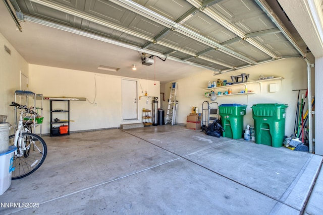 8975 Sorcha St, Reno, NV 89506 - garage with a garage door opener