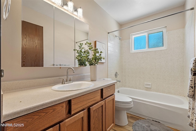 295 Sandia Dr, Fernley, NV 89408 - bathroom featuring shower / tub combination, vanity, toilet, and wood finished floors