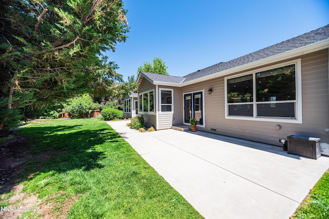 867 Mahogany Dr, Minden, NV 89423 - back of property featuring a patio and a yard