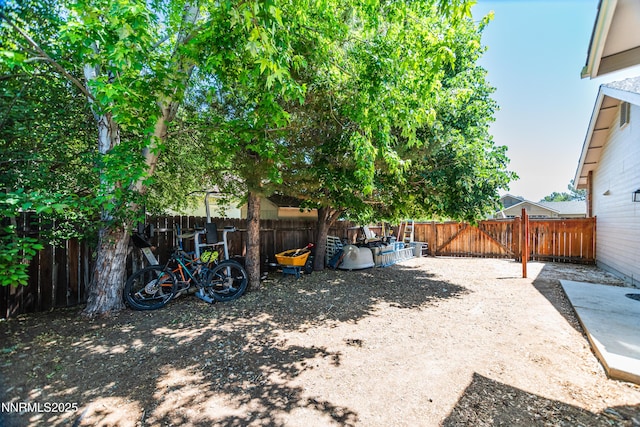 867 Mahogany Dr, Minden, NV 89423 - fenced backyard featuring a patio area