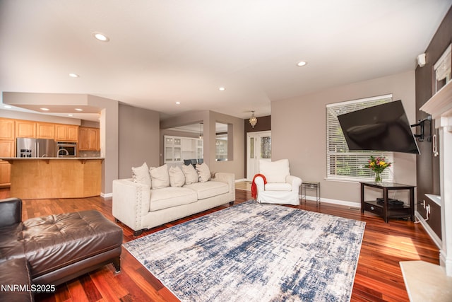 867 Mahogany Dr, Minden, NV 89423 - living area featuring baseboards, recessed lighting, and wood finished floors