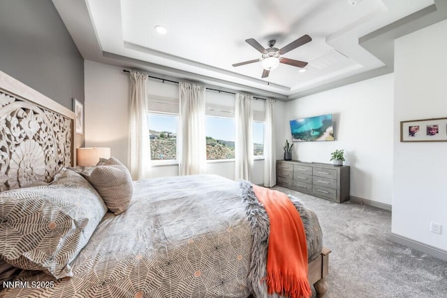 1536 Elk Run Trl, Reno, NV 89523 - carpeted bedroom featuring a raised ceiling, baseboards, a ceiling fan, and recessed lighting