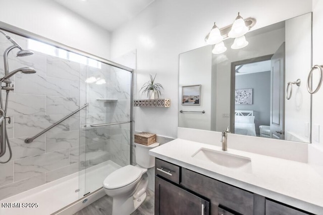 1536 Elk Run Trl, Reno, NV 89523 - full bathroom featuring a marble finish shower, vanity, and toilet