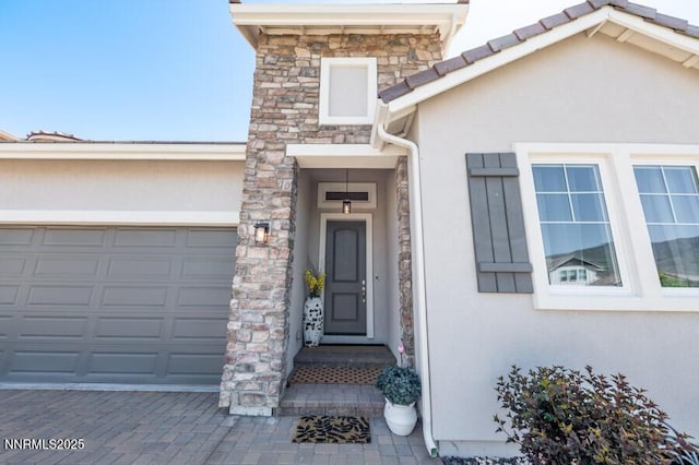 1536 Elk Run Trl, Reno, NV 89523 - entrance to property with stucco siding, stone siding, and an attached garage