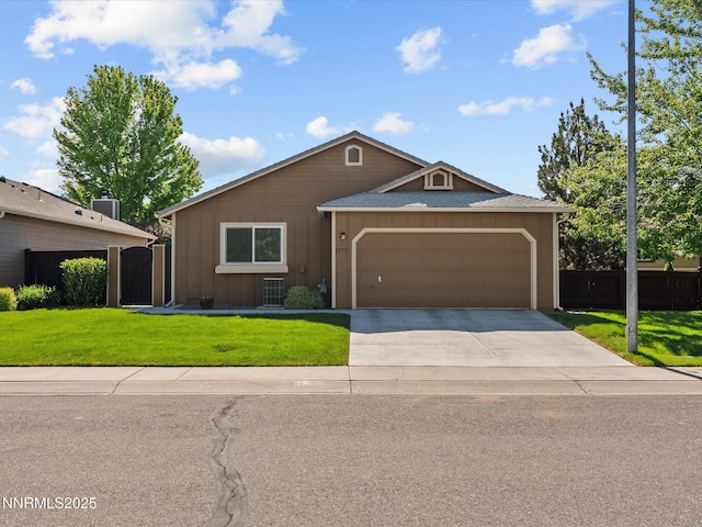 1772 Shamrock Cir, Minden, NV 89423 - ranch-style home with board and batten siding, concrete driveway, and an attached garage