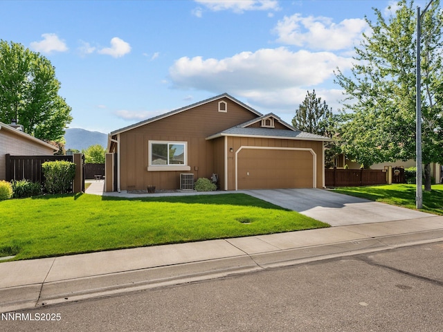 1772 Shamrock Cir, Minden, NV 89423 - single story home featuring an attached garage, driveway, central AC, board and batten siding, and a mountain view
