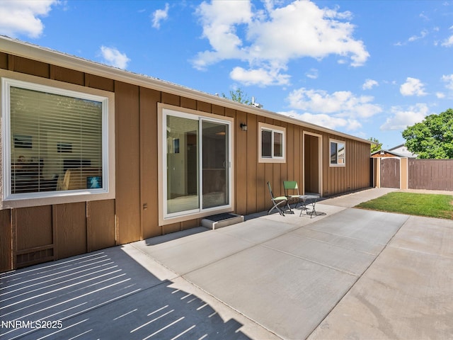 1772 Shamrock Cir, Minden, NV 89423 - back of property featuring a patio and board and batten siding