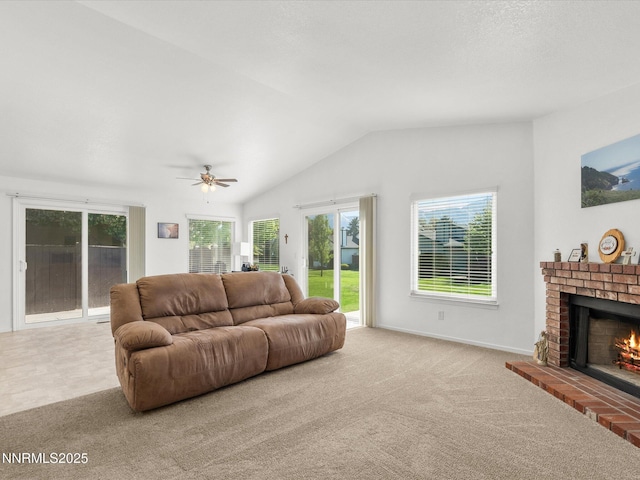 1772 Shamrock Cir, Minden, NV 89423 - carpeted living room with a fireplace, lofted ceiling, and a ceiling fan