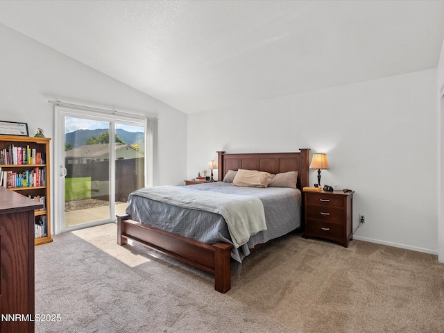 1772 Shamrock Cir, Minden, NV 89423 - carpeted bedroom featuring access to exterior and vaulted ceiling