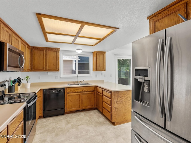 1772 Shamrock Cir, Minden, NV 89423 - kitchen with stainless steel appliances, a sink, and brown cabinetry