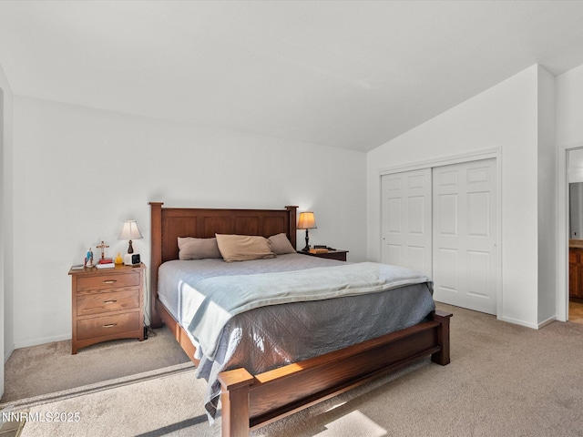 1772 Shamrock Cir, Minden, NV 89423 - bedroom with light colored carpet, lofted ceiling, a closet, and baseboards