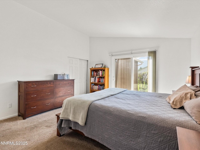 1772 Shamrock Cir, Minden, NV 89423 - bedroom featuring lofted ceiling, light colored carpet, and a closet