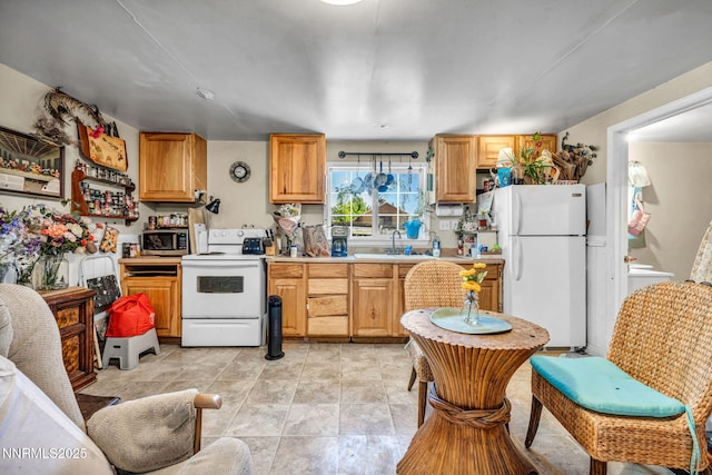 2350 Jacks Valley Rd, Genoa, NV 89411 - kitchen with white appliances, light countertops, and a sink