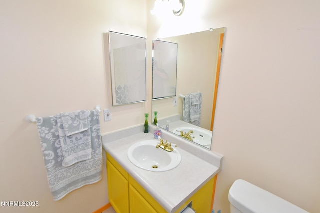 2213 Kietzke Ln Unit H, Reno, NV 89502 - half bathroom with vanity and toilet