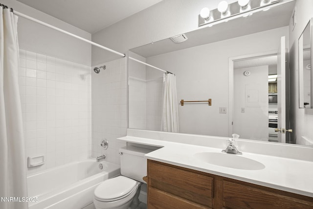 2875 Idlewild Dr Unit 106, Reno, NV 89509 - bathroom featuring shower / bath combination with curtain, vanity, and toilet