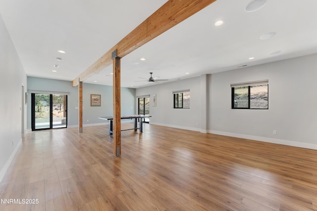 2620 Old Ranch Rd, Gardnerville, NV 89410 - unfurnished living room featuring healthy amount of natural light, decorative columns, recessed lighting, light wood-style floors, and beamed ceiling