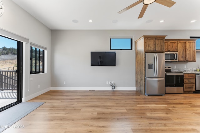 2620 Old Ranch Rd, Gardnerville, NV 89410 - kitchen with appliances with stainless steel finishes, ceiling fan, recessed lighting, light wood-style flooring, and light countertops