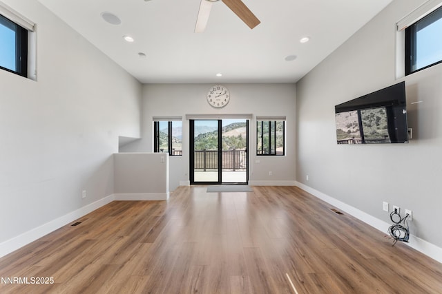 2620 Old Ranch Rd, Gardnerville, NV 89410 - unfurnished living room featuring recessed lighting, light wood-style flooring, and a ceiling fan