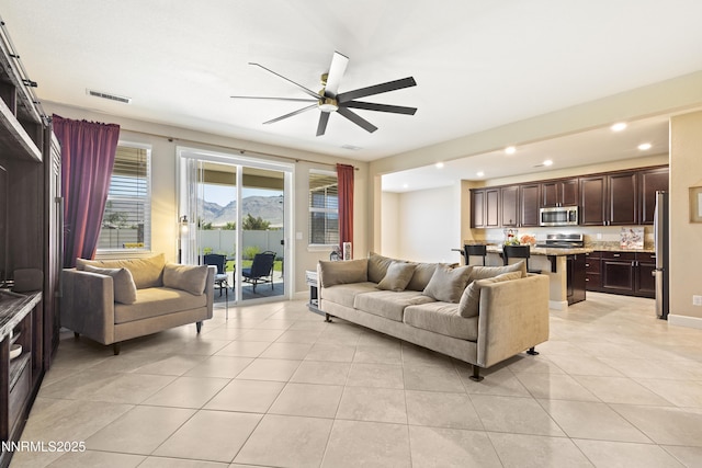 10460 Mott Ct, Reno, NV 89521 - living room featuring recessed lighting, a ceiling fan, and light tile patterned flooring