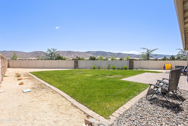 10460 Mott Ct, Reno, NV 89521 - view of yard featuring a patio and a mountain view