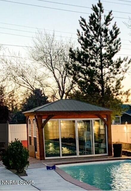 2195 W Plumb Ln, Reno, NV 89509 - view of swimming pool with a gazebo