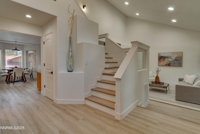 471 Kent Way, Zephyr Cove, NV 89448 - staircase featuring wood finished floors, recessed lighting, baseboards, and vaulted ceiling