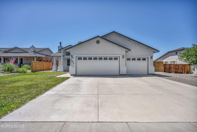 753 Divot Dr, Fernley, NV 89408 - single story home with an attached garage, driveway, and stucco siding