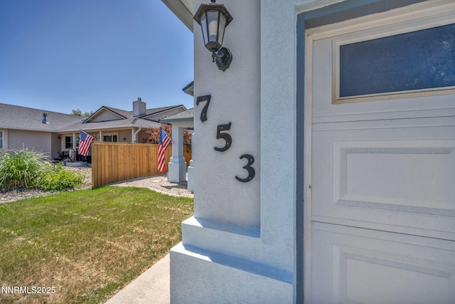 753 Divot Dr, Fernley, NV 89408 - entrance to property with stucco siding