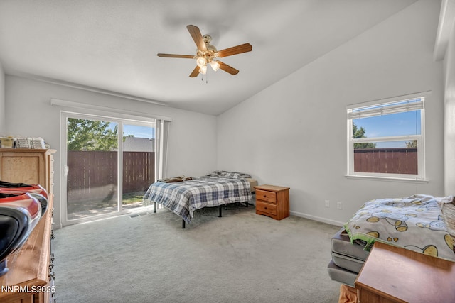 753 Divot Dr, Fernley, NV 89408 - bedroom featuring access to outside, vaulted ceiling, carpet, a ceiling fan, and baseboards