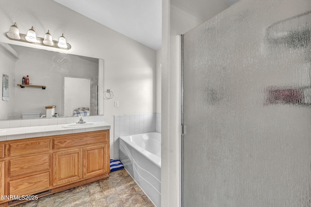 753 Divot Dr, Fernley, NV 89408 - bathroom with vanity, a bath, a shower stall, and lofted ceiling
