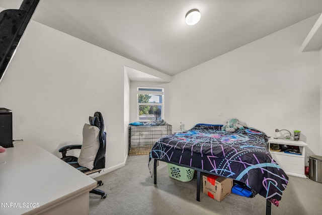 753 Divot Dr, Fernley, NV 89408 - carpeted bedroom featuring an office area, lofted ceiling, and baseboards