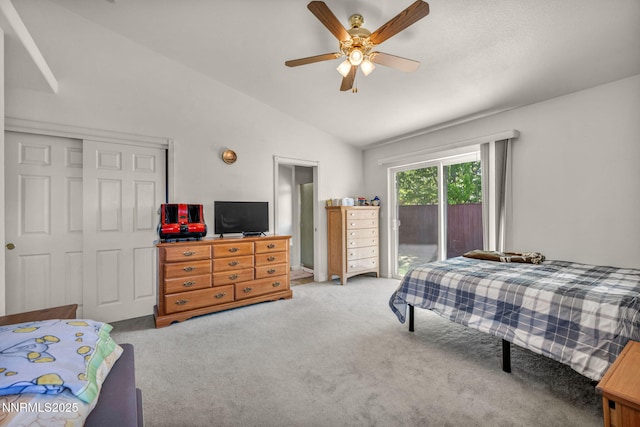 753 Divot Dr, Fernley, NV 89408 - bedroom featuring access to outside, vaulted ceiling, light colored carpet, ceiling fan, and a closet