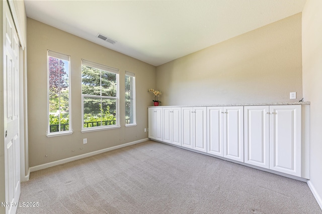 8890 Chipshot Trl, Reno, NV 89523 - unfurnished room featuring baseboards and light carpet