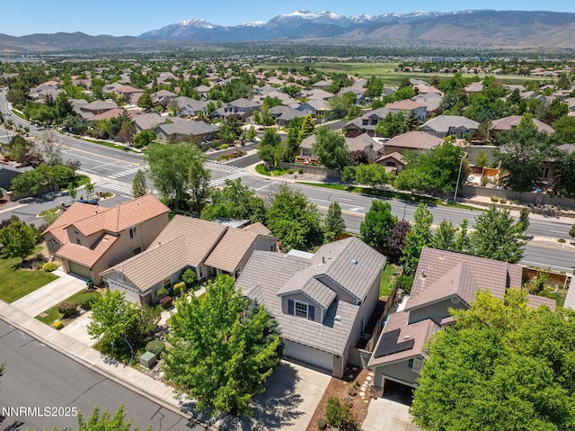 9783 Northrup Dr, Reno, NV 89521 - aerial perspective of suburban area featuring a mountainous background