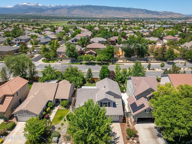 9783 Northrup Dr, Reno, NV 89521 - aerial perspective of suburban area featuring a mountainous background