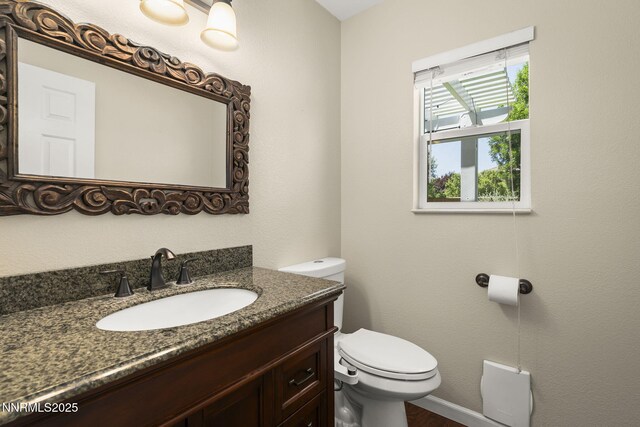 9783 Northrup Dr, Reno, NV 89521 - bathroom featuring vanity and wood finished floors