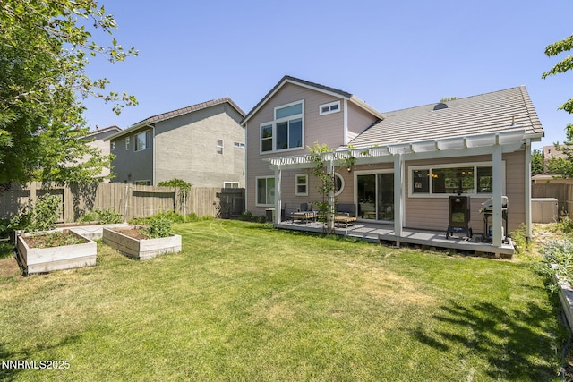 9783 Northrup Dr, Reno, NV 89521 - rear view of property featuring a deck, a vegetable garden, a pergola, and a tile roof