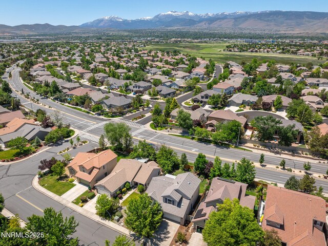 9783 Northrup Dr, Reno, NV 89521 - aerial perspective of suburban area with a mountain backdrop