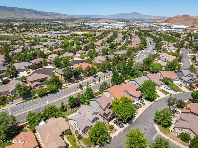 9783 Northrup Dr, Reno, NV 89521 - aerial view of residential area with a mountainous background