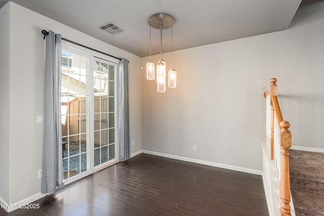 1875 Wind Ranch Rd Unit A, Reno, NV 89521 - unfurnished dining area with dark wood finished floors and baseboards