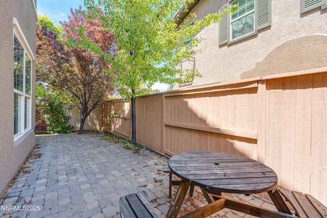 1875 Wind Ranch Rd Unit A, Reno, NV 89521 - fenced backyard with a patio area