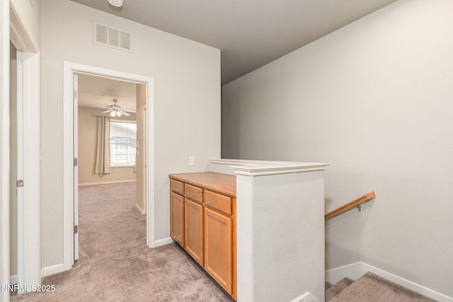 1875 Wind Ranch Rd Unit A, Reno, NV 89521 - corridor featuring light colored carpet, an upstairs landing, and baseboards